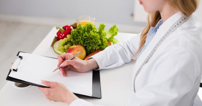 diet-concept-with-female-scientist-healthy-food