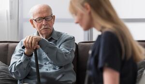 old-man-being-consulted-by-nurse (1)