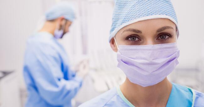 portrait-female-dentist-wearing-surgical-mask