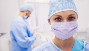 portrait-female-dentist-wearing-surgical-mask